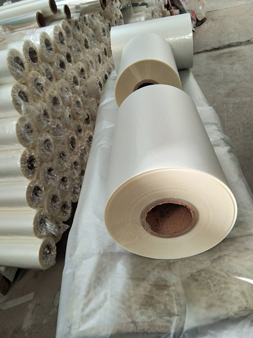 laminating film, pouches and sheets